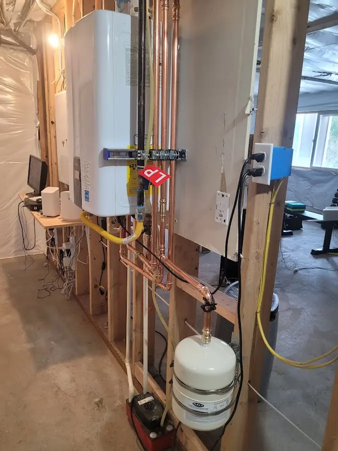 Licensed plumber repairing a kitchen sink in Schaumburg